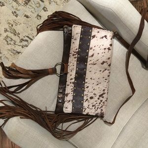 Fun repurposed “LV” over shoulder purse